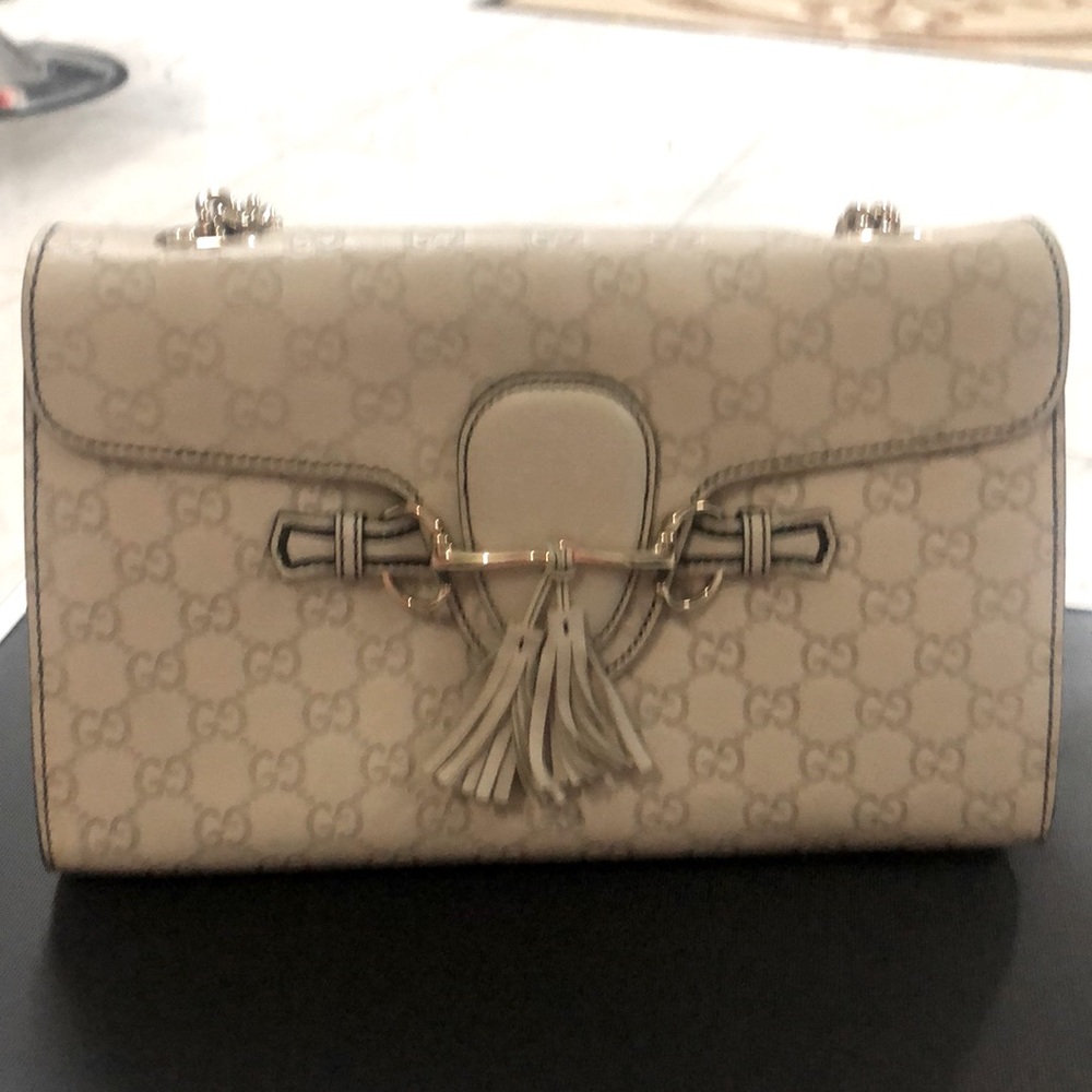 Ivory Gucci authentic bag. NWOT. This is the latest Gucci trending bag.